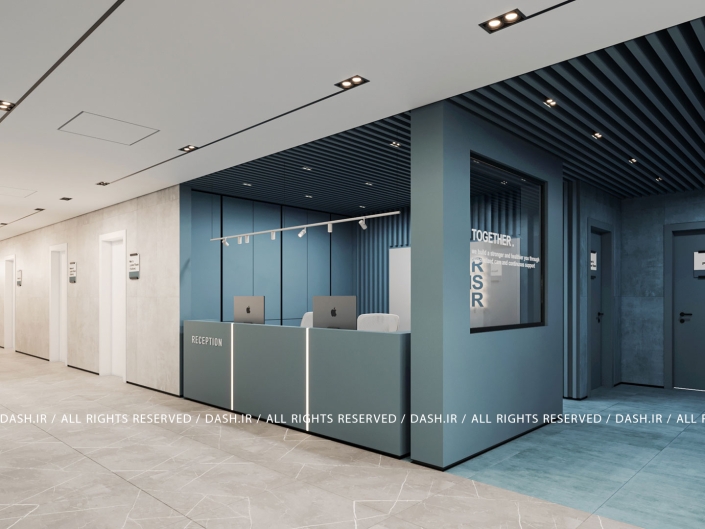 مرکز دیالیز رودسر ریسپشن آبی و خاکستری در فضای درمانی با سقف خطی تیره.