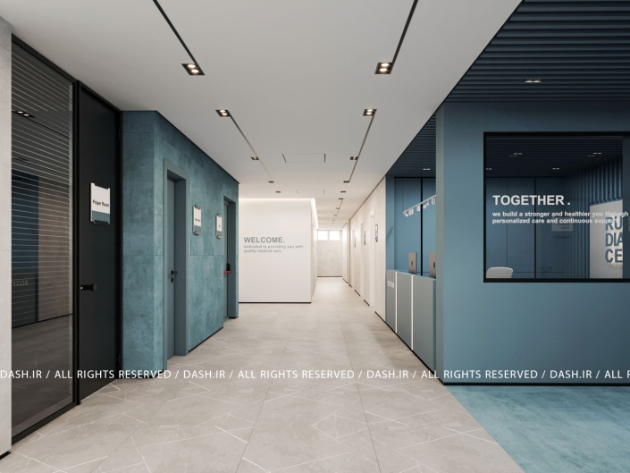 مرکز دیالیز رودسر راهروی مدرن درمانی با دیوارهای آبی و طوسی و نورپردازی خطی.