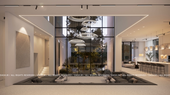 آشپزخانه و سالن ویلا رویان نشیمن گود دوبلکس با دیوار شیشهای بلند و لوسترهای حلقهای معلق.