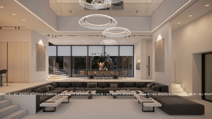 سالن ویلا رویان نشیمن دوبلکس مدرن با مبلمان U شکل طوسی و لوسترهای حلقهای.