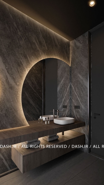 سرویس بهداشتی ویلا رویان روشویی مدرن با نورپردازی قوسی و سنگ تیره.