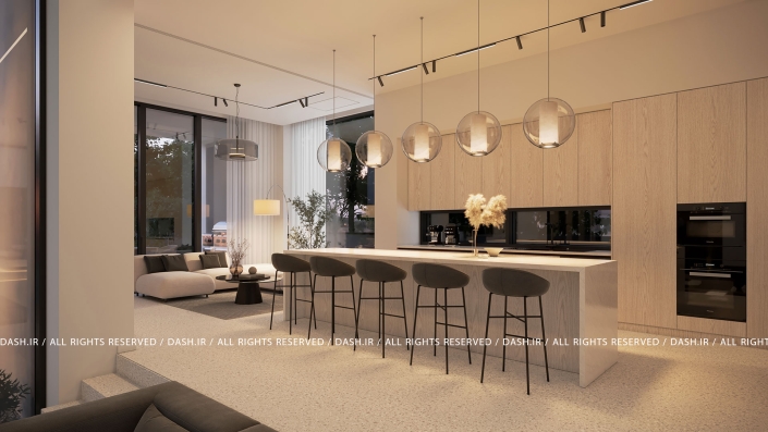 آشپزخانه ویلا رویان آشپزخانه مدرن با جزیره بزرگ، آویزهای شیشهای و نشیمن یکپارچه کنار پنجرههای قدی.