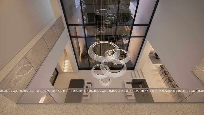 ووید ویلا رویان نما از بالا به فضای دوبلکس با لوستر حلقهای بزرگ و پنجرههای قدی.